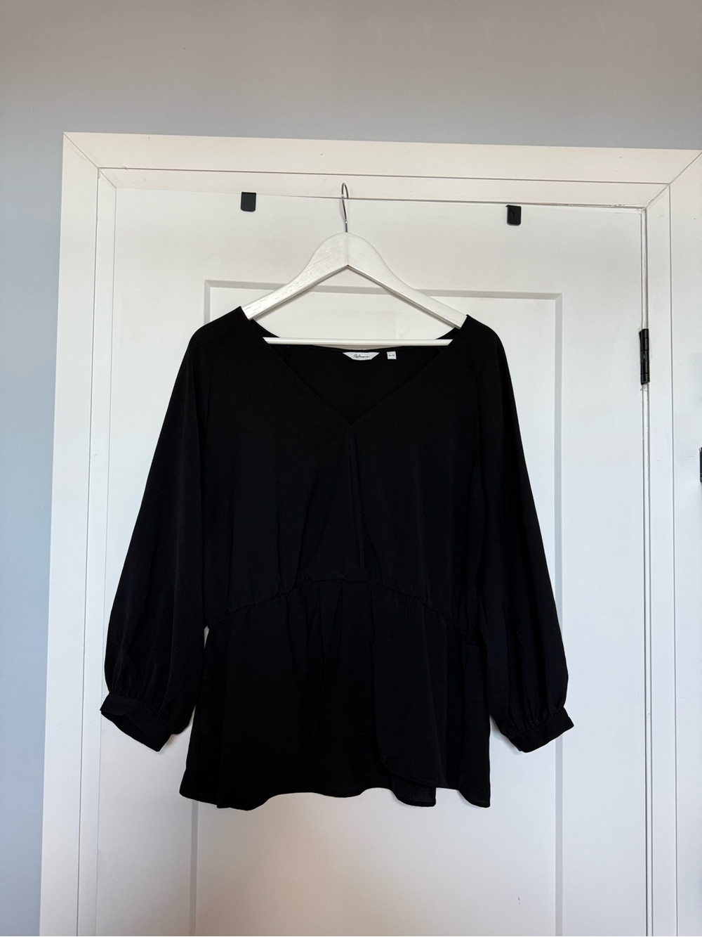 Black waist cinched top